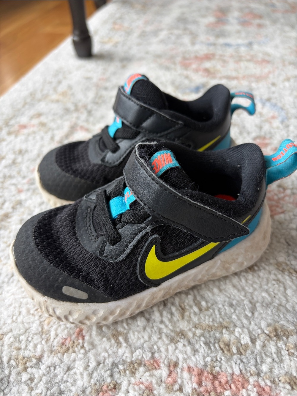 Nike toddler/baby Black Sneakers with Neon Yellow Swoosh and Aqua Accents